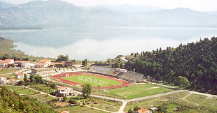 The stadium with the lake of Kastoria in the background 